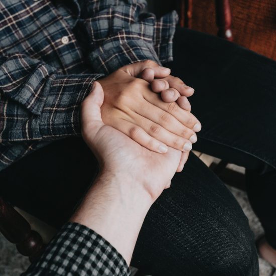 People holding hands, self help and depression concept, minimal copy space